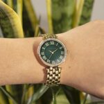 Anne Klein Women’s Premium Crystal Accented Gold-Tone Bracelet Watch, AK/2230GNGB